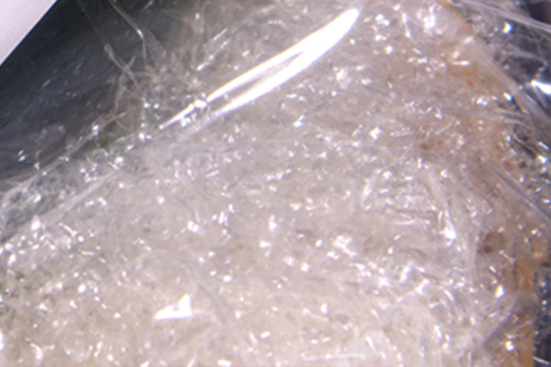 DELUCAD93127 -- 000 (8575) Truciolo cellophane Bianco kg 1 per ceste regalo - immagine 1